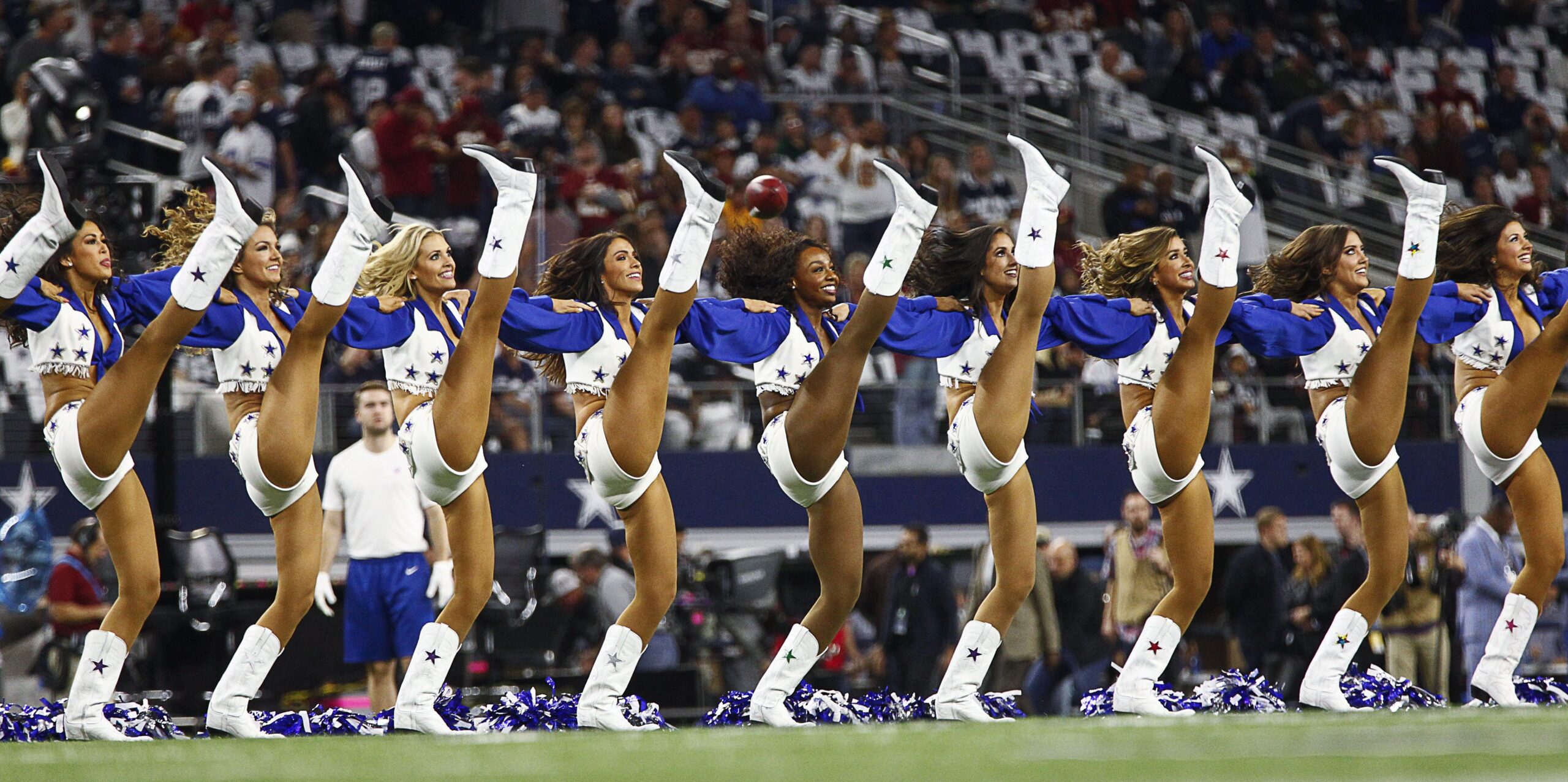 The Dallas Cowboys Cheerleaders kick line at The Dallas Cowboys vs the Washington Redskins game
