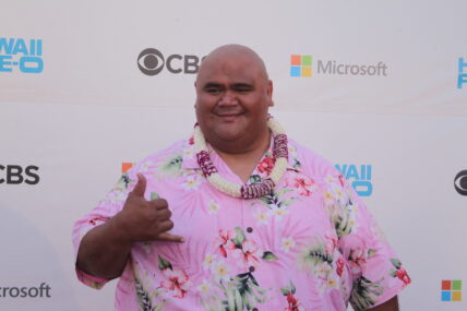 Taylor Wily in pink Hawaiin shirt