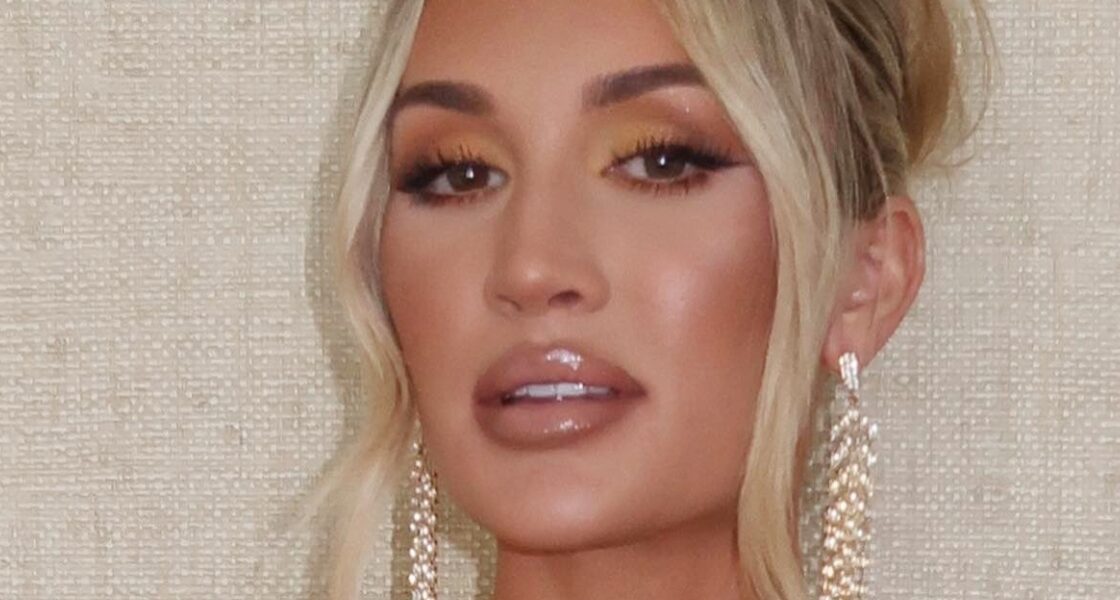 Brittany Aldean poses close up