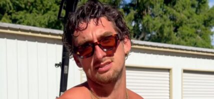 TooTurntTony smiling in sunglasses