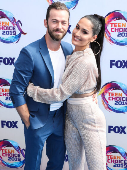 Artem Chigvintsev and Nikki Garcia at FOX's Teen Choice Awards 2019