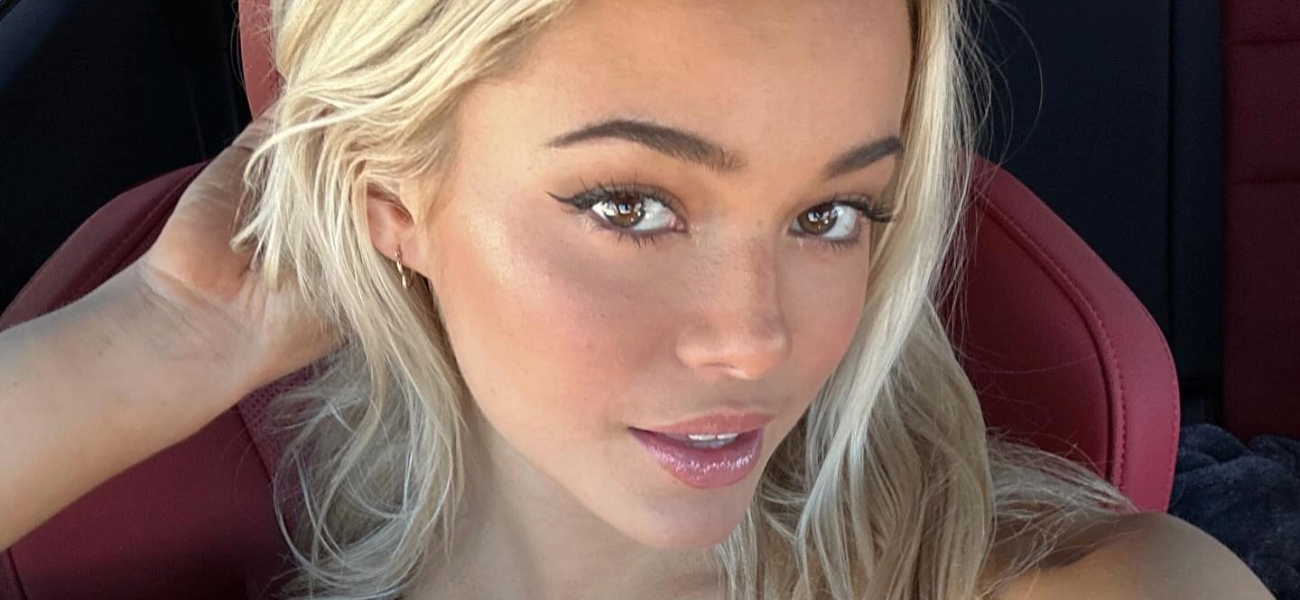 Olivia Dunne 'Breaks The In Plunging Glitter Swimsuit