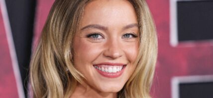 Sydney Sweeney smiling close up