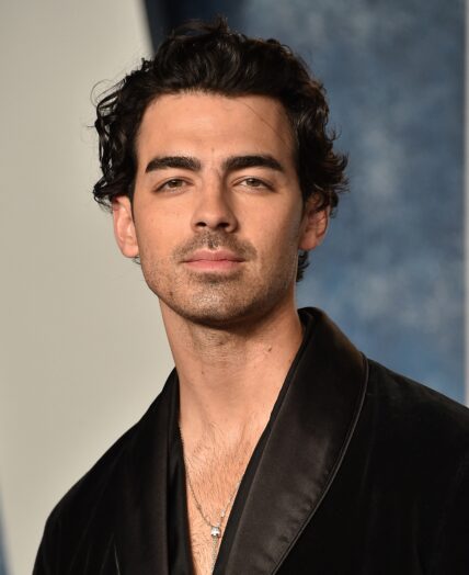 Joe Jonas arriving at the Vanity Fair Oscar Party