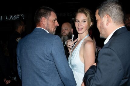 Lana Del Rey looks at camera