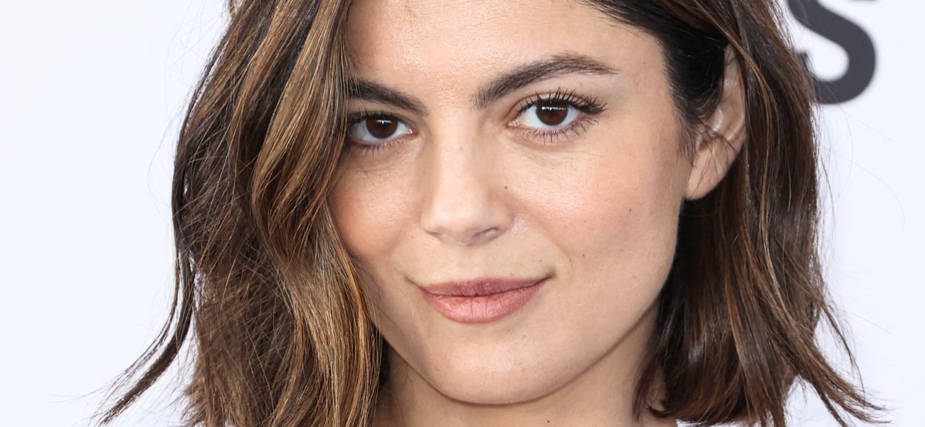 Monica Barbaro Smiling In Plunging Bikini Questioned Over Her ‘Implants’