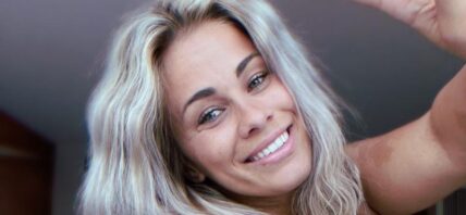 Paige VanZant smiles at the camera.