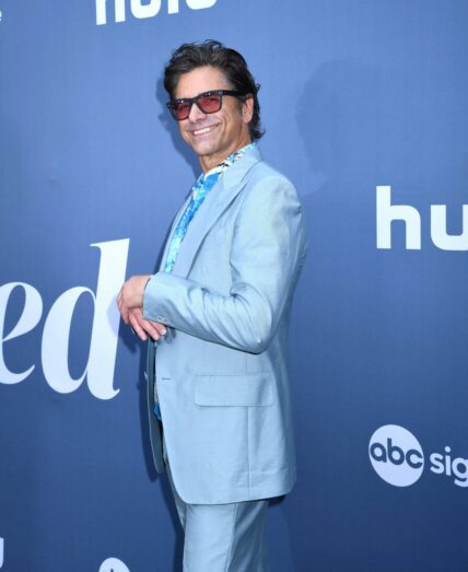 John Stamos is all smiles at premiere for UnPrisoned