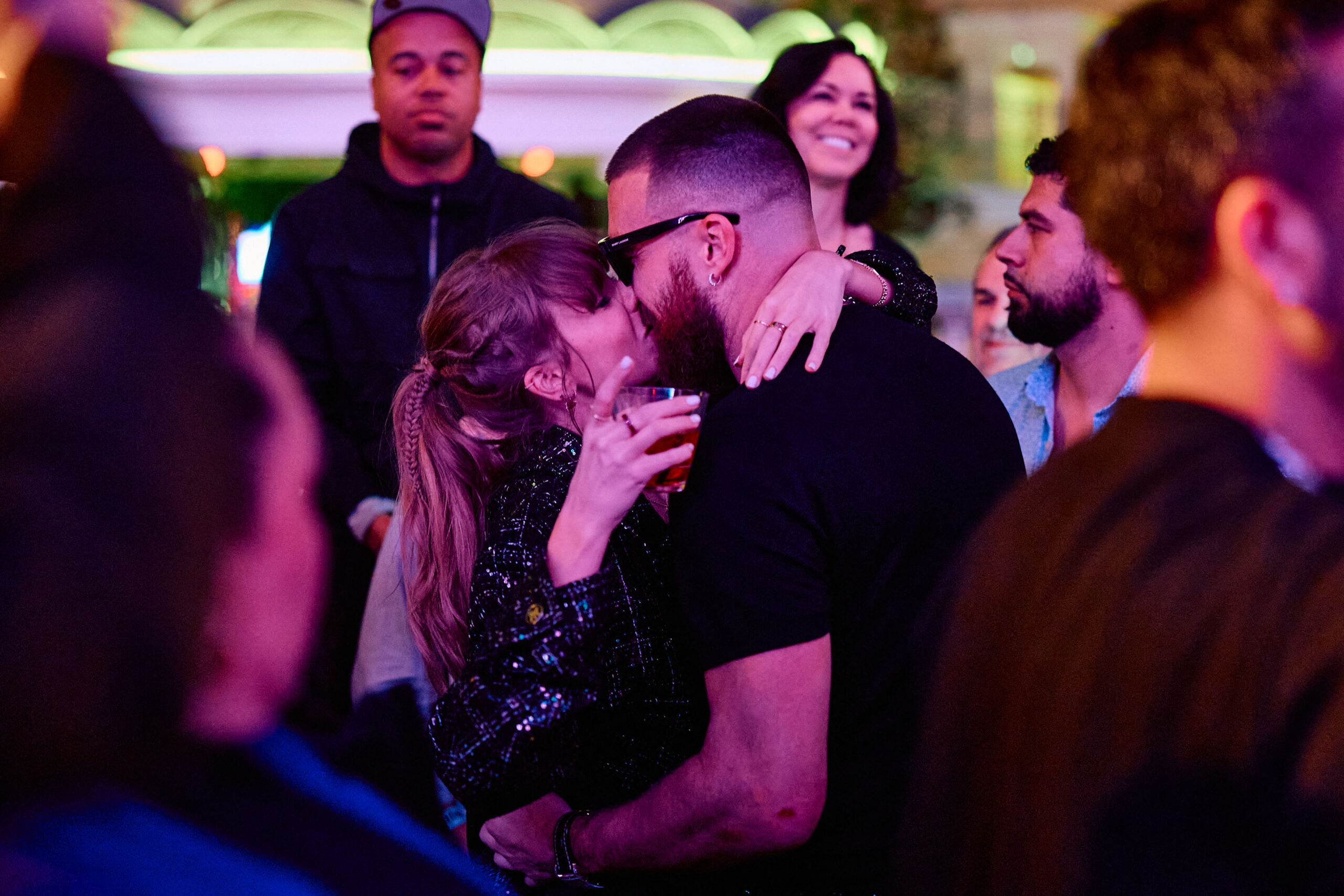 Taylor Swift and Travis Kelce share a lil smooch