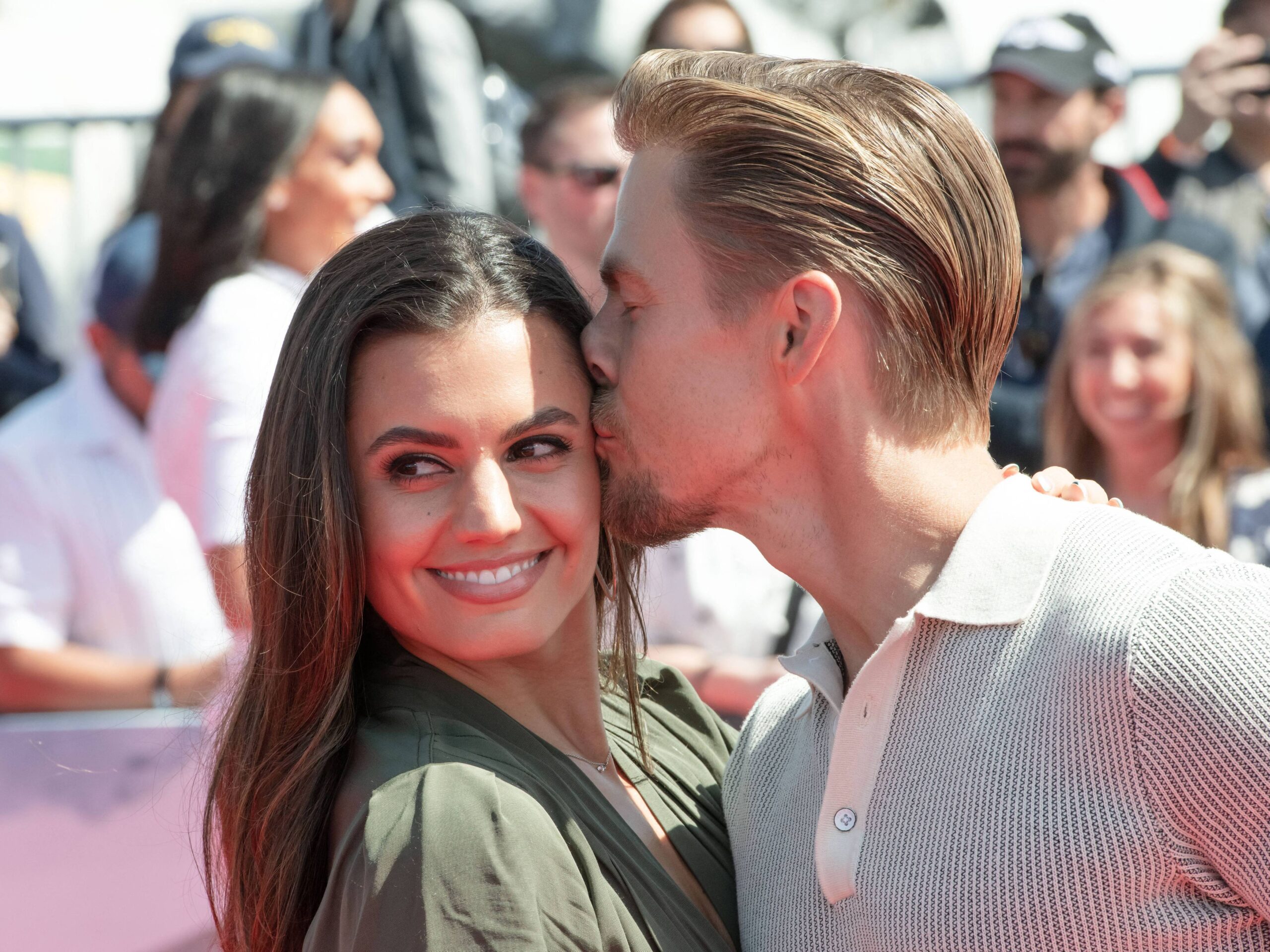 Derek Hough kissing Hayley Erbert