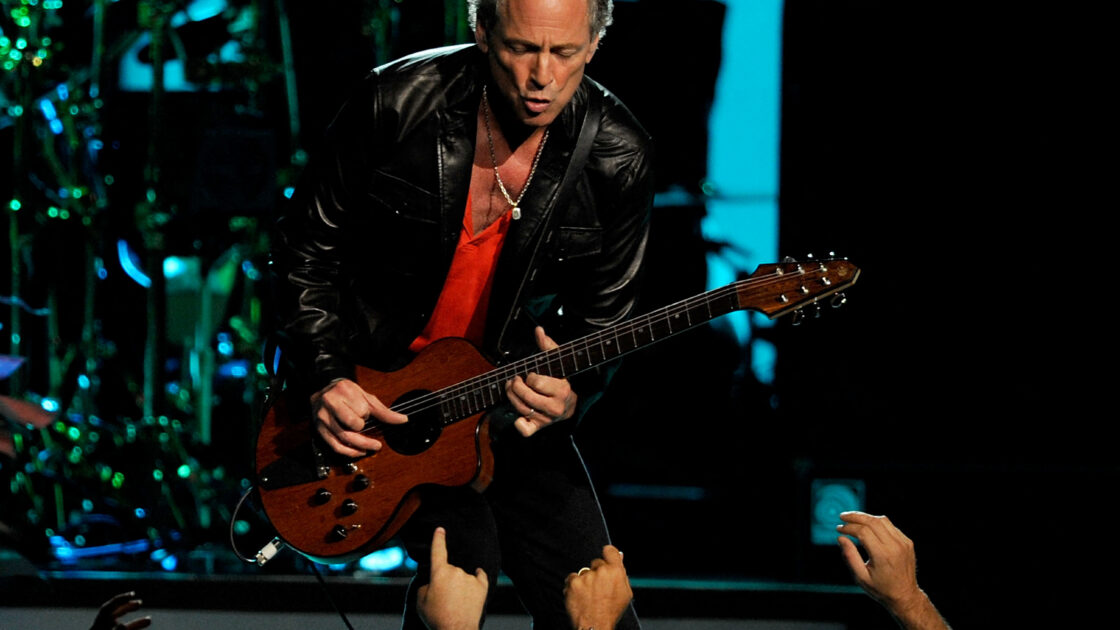 Lindsey Buckingham performs with Rock band Fleetwood Mac live in concert at Bank Atlantic Center