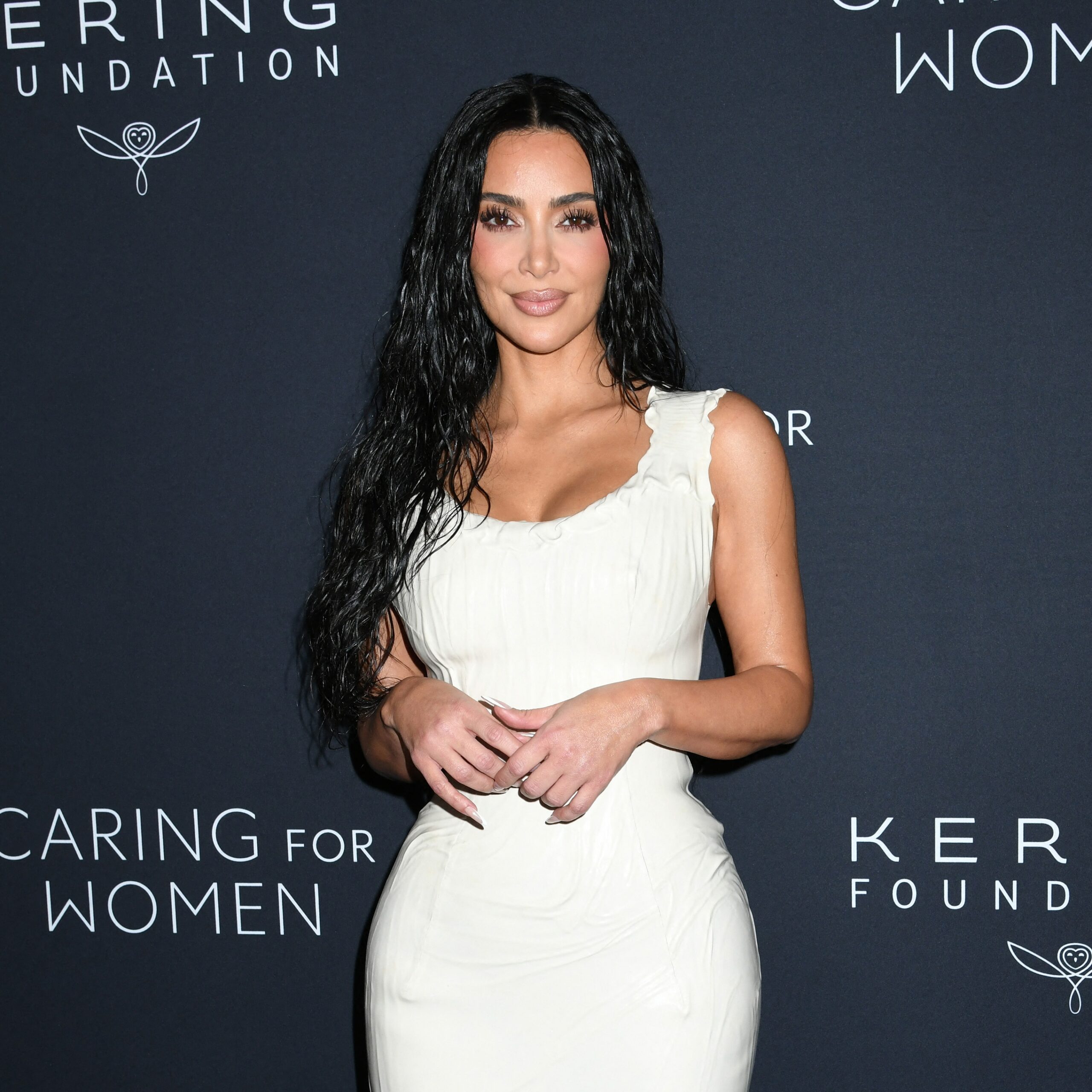 Kim Kardashian Turns Heads In Plunging Red Dress With Cutouts