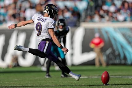 Justin Tucker kicking a football