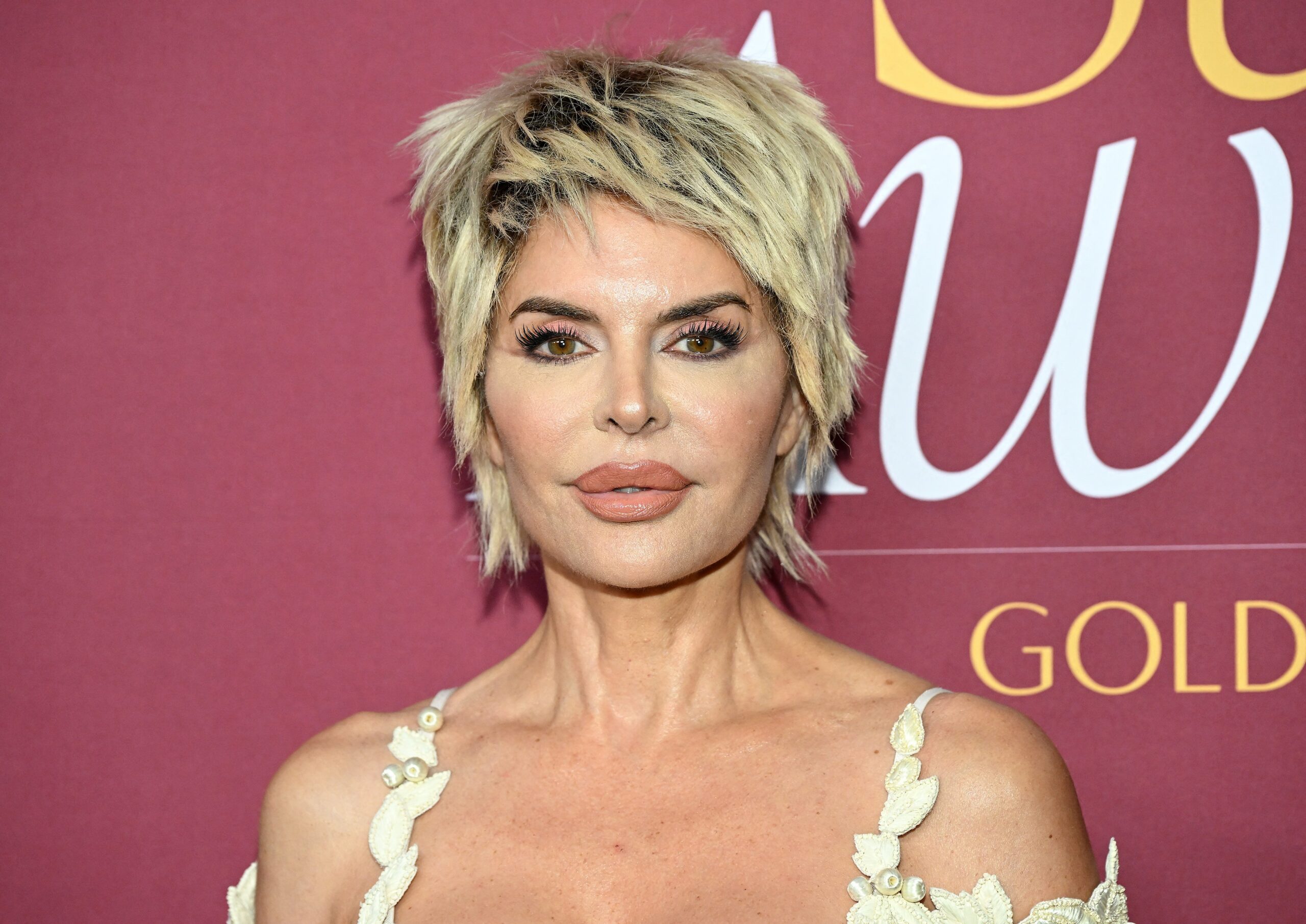 Lisa Rinna Turns Heads With Bold Wigs At Paris Couture Week
