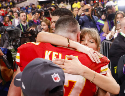 Taylor Swift embraces beau Travis Kelce after the Kansas City Chiefs win the super bowl beating the San Francisco 49ers 25-22.
