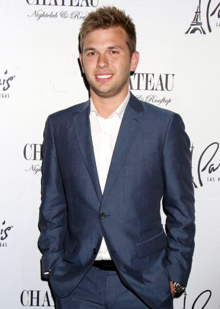Chase Chrisley posing on the red carpet.