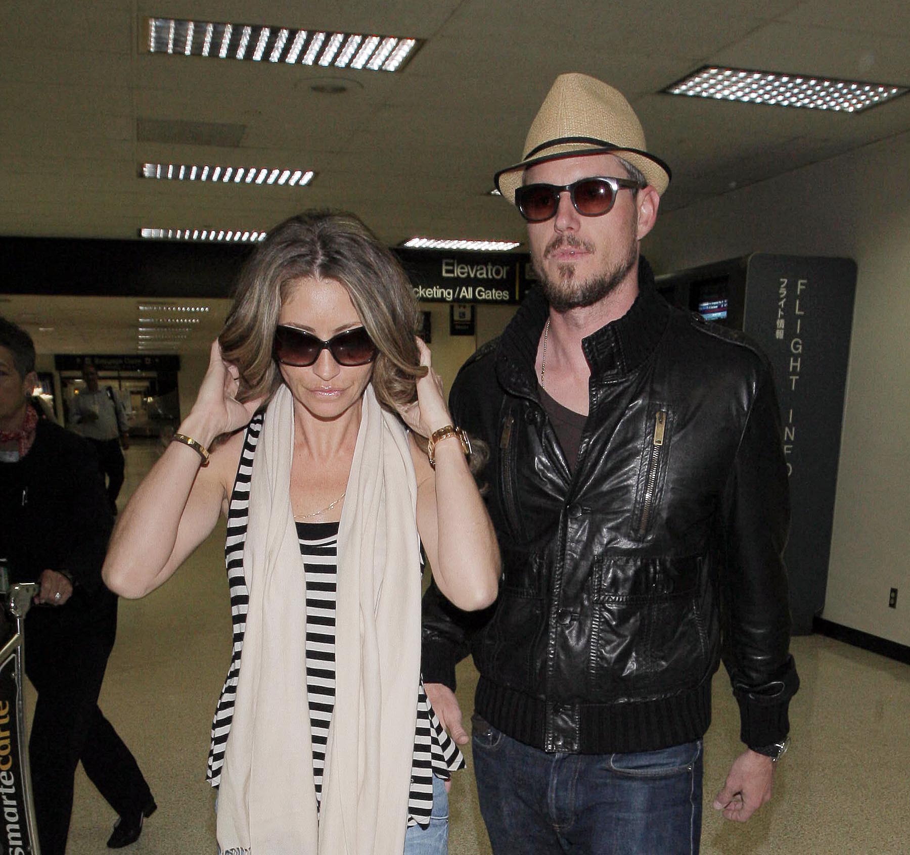 ERIC DANE AND WIFE REBECCA GAYHEART AT LAX