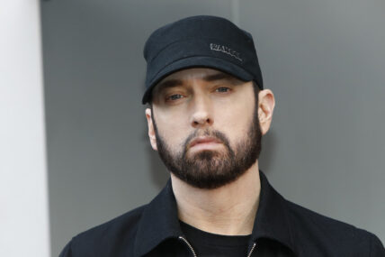 Eminem wearing a baseball cap