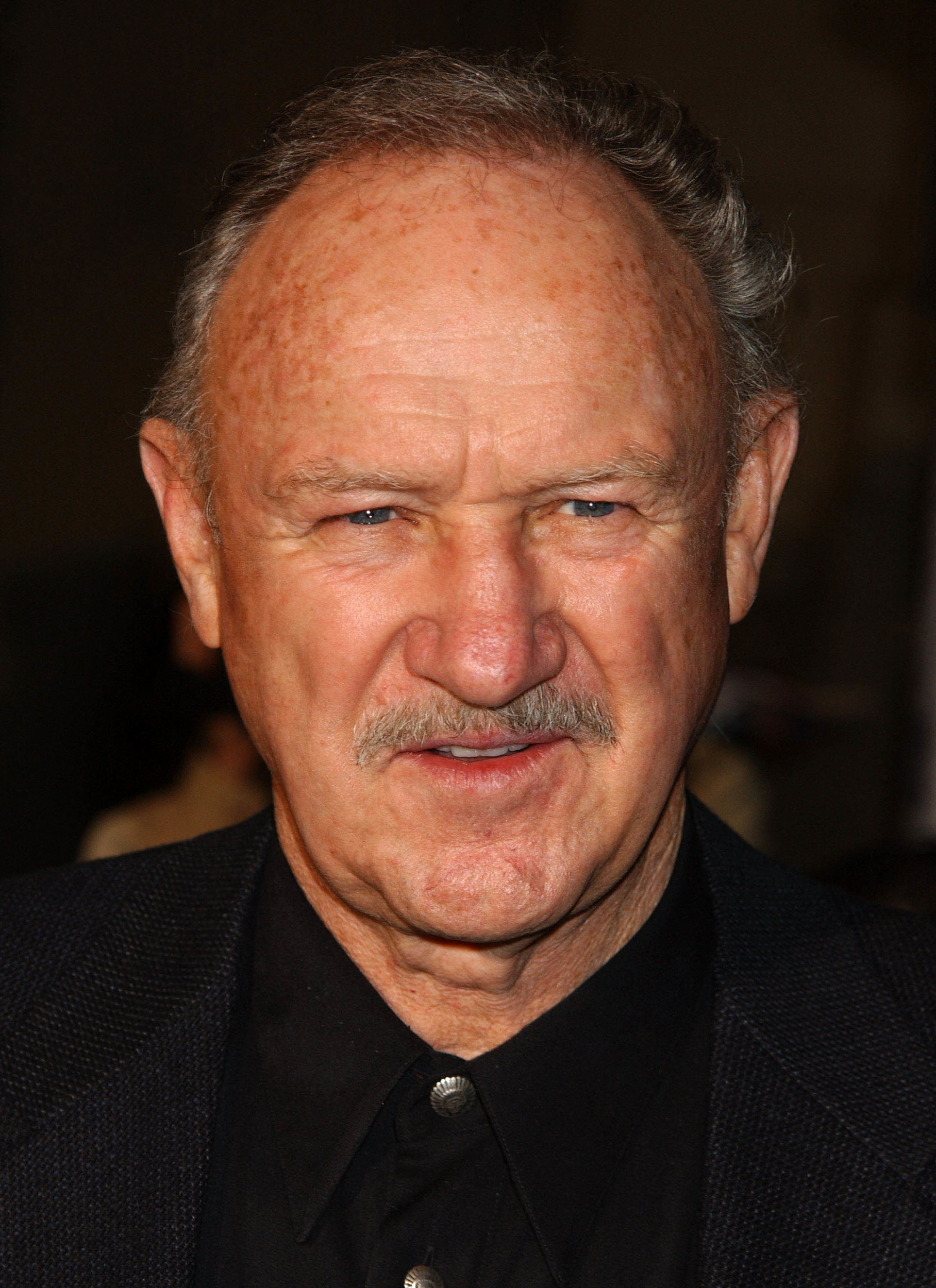 Gene Hackman wearing black