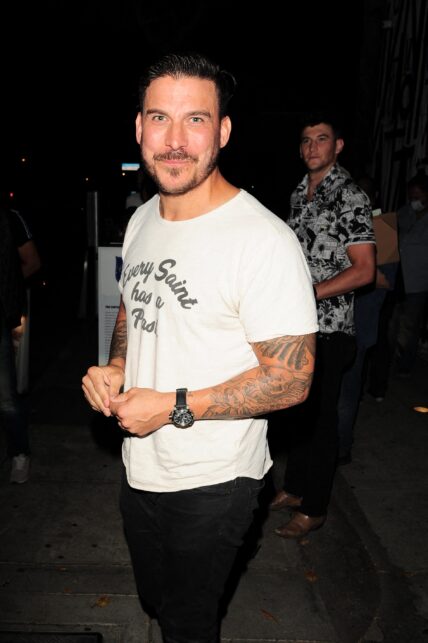 Jax Taylor smiling for a picture at a popular eatery in California.