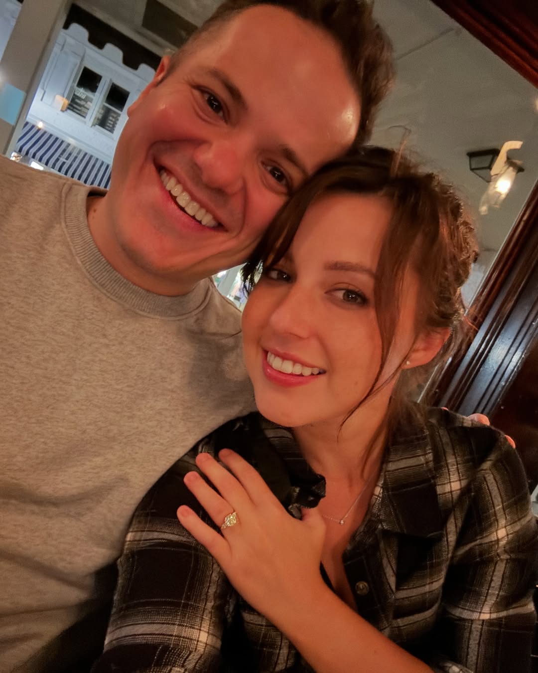Katie Thurston showing off engagement ring