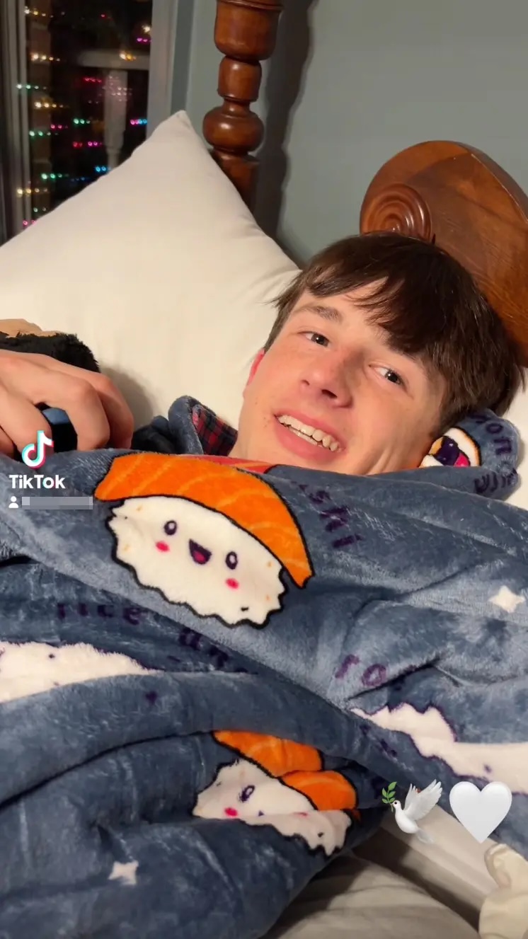 Miller Gardner laying in bed