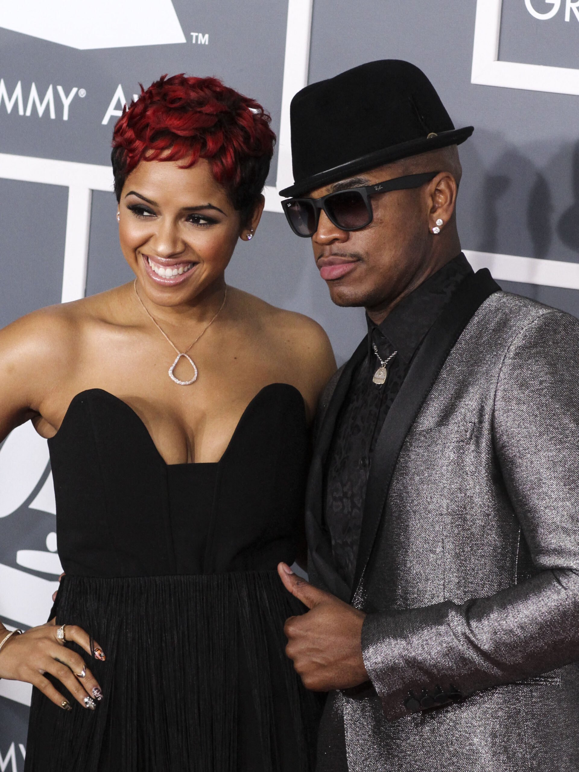 Ne-Yo and Monyetta Shaw posing on the red carpet in 2013.