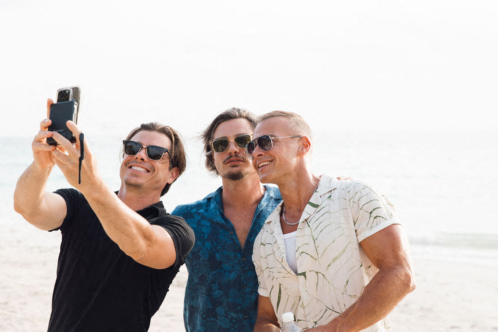 Matthew Lawrence with his brothers at the beach