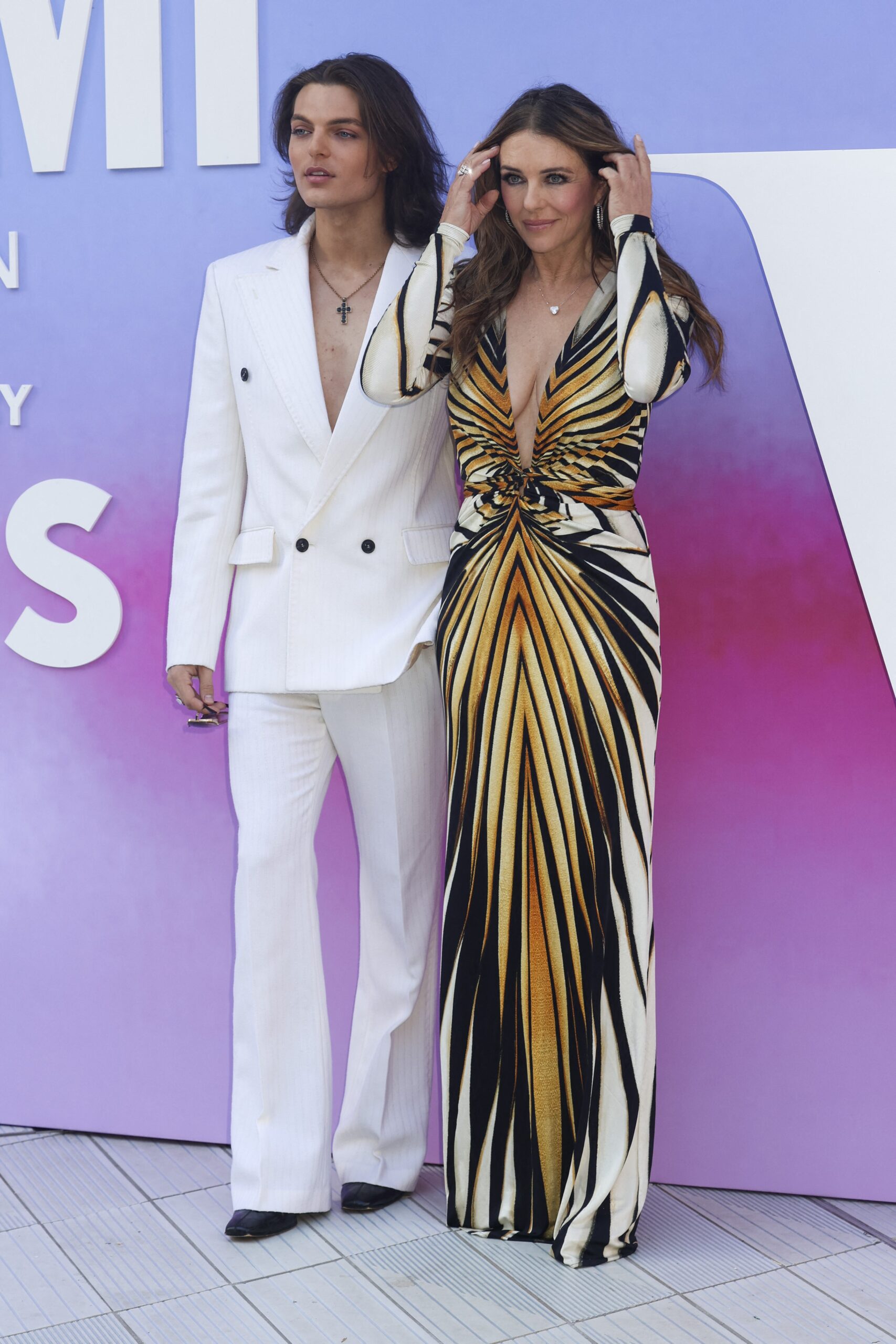 Damian Hurley and Elizabeth Hurley at V©