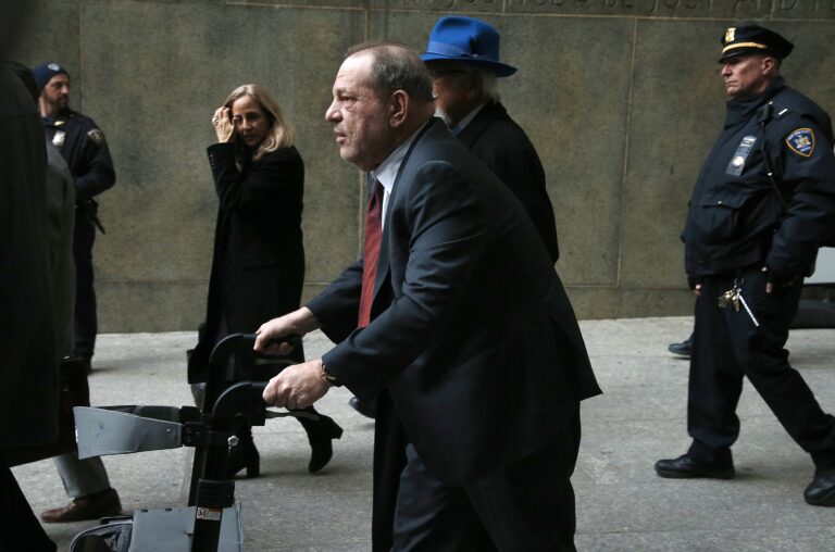 Harvey Weinstein walking
