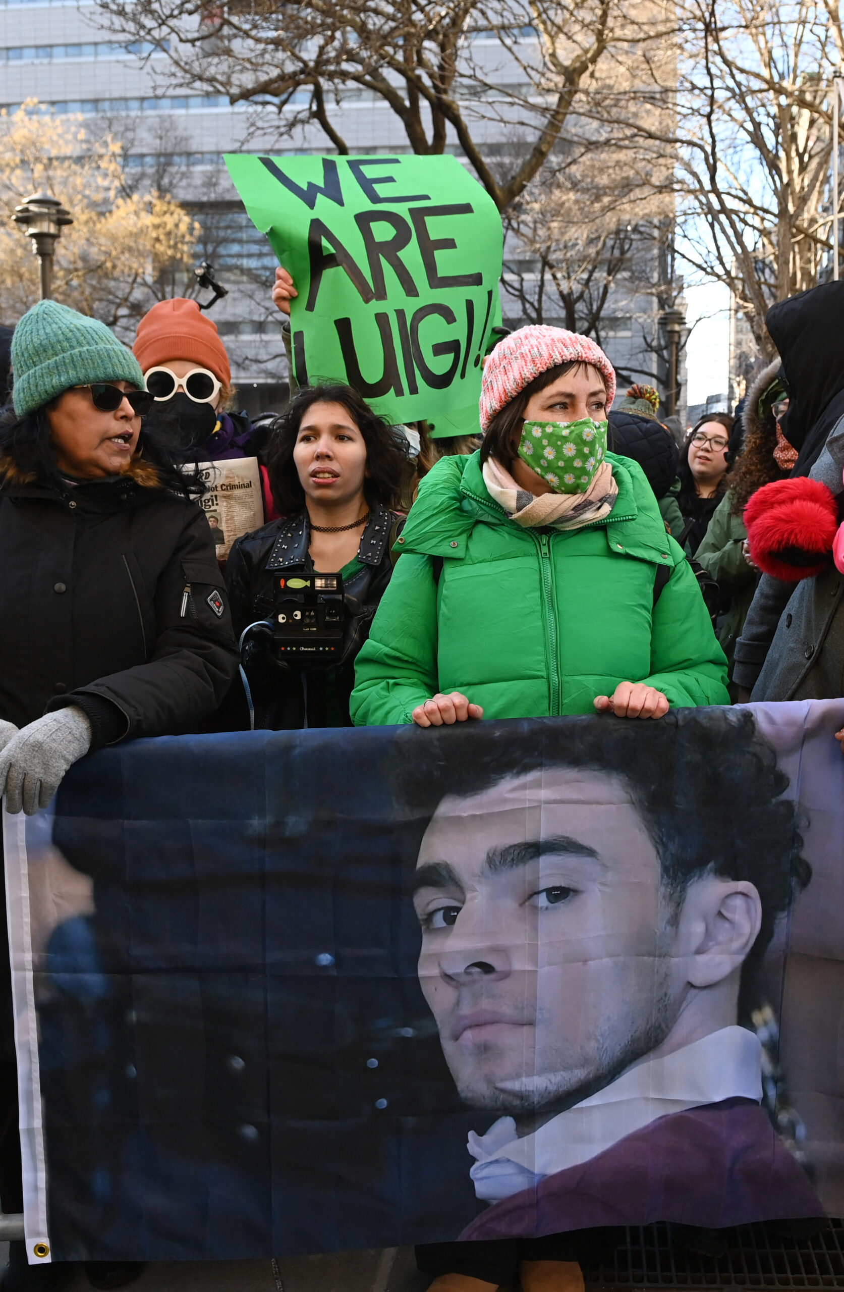 Luigi Mangione in Court has supporters outside