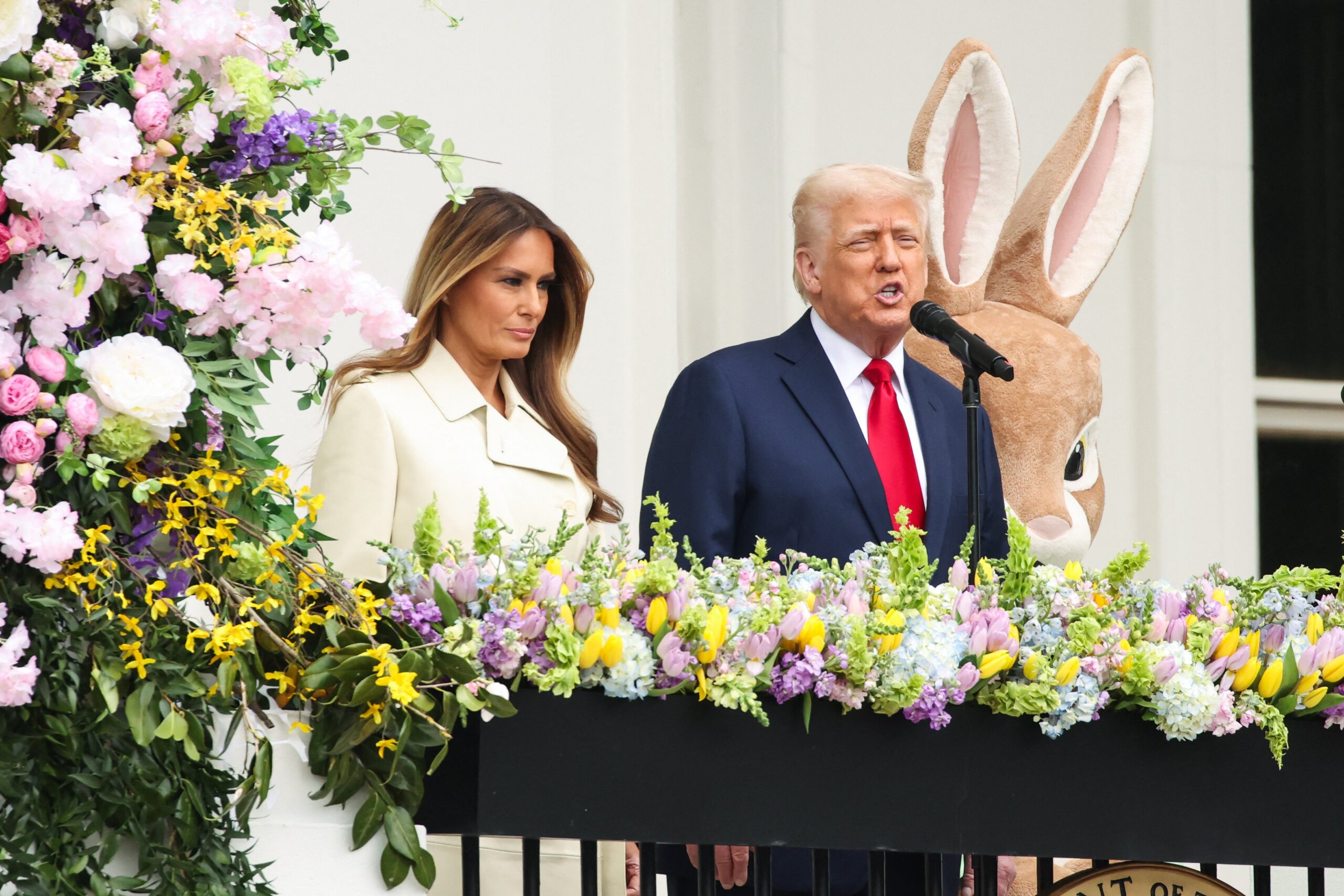 President Donald Trump and First Lady Melania Trump join guests for the start of the egg roll race during the 2025 Easter Egg Roll on the South Lawn