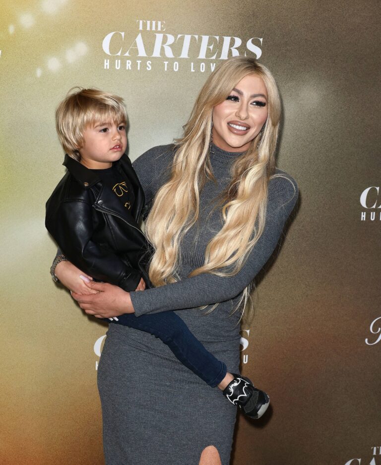 Melanie Carter holding Prince Carter