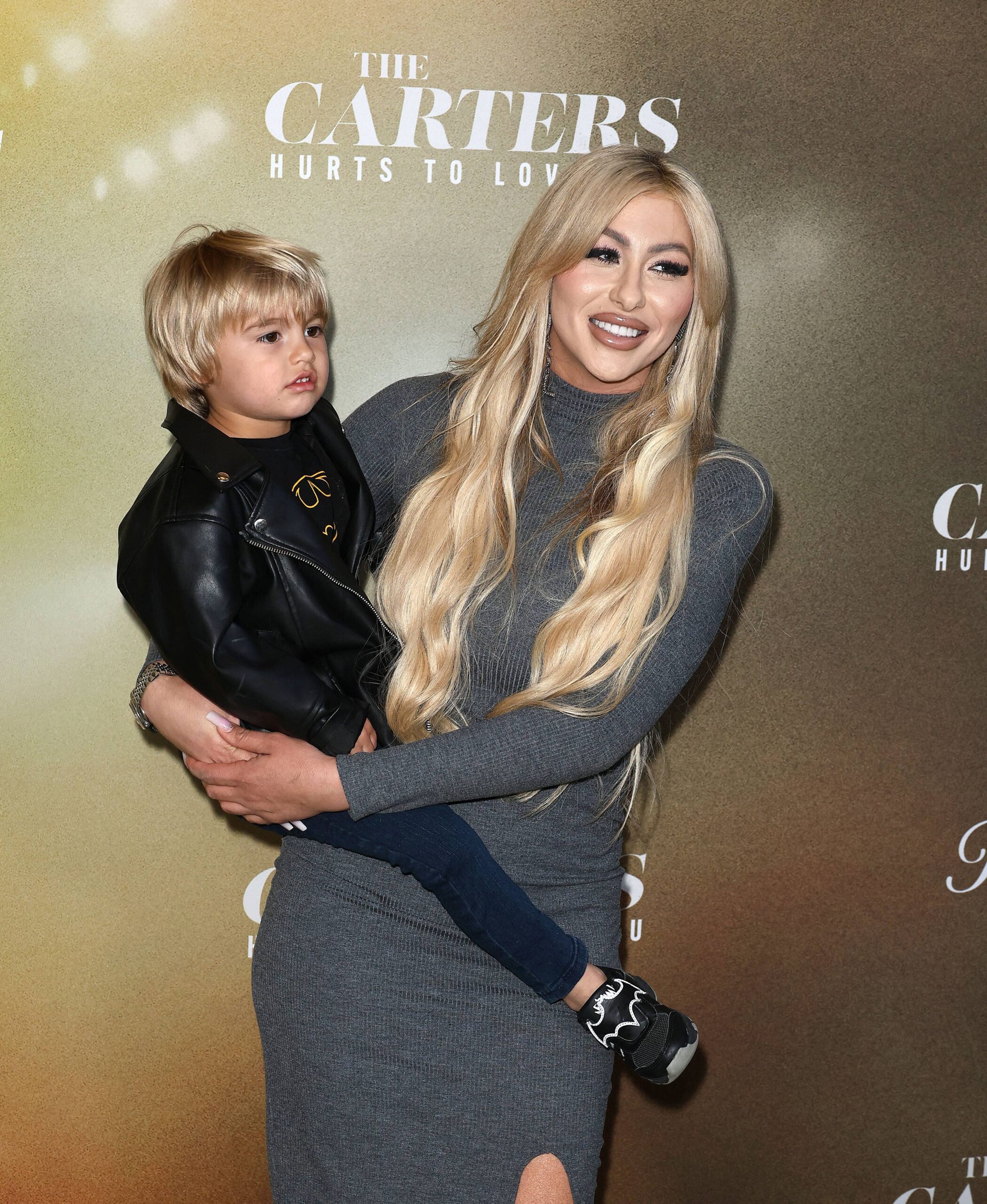 Melanie Carter holding Prince Carter