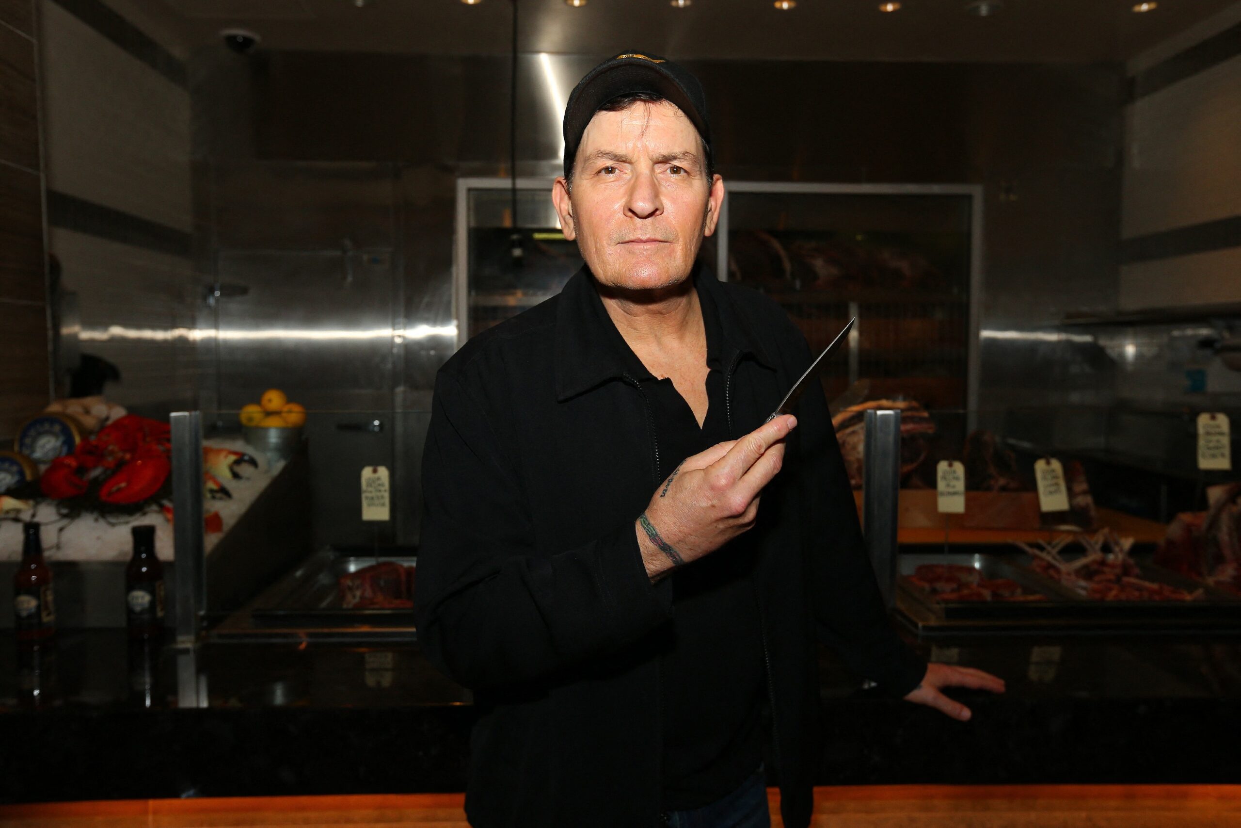 Charlie Sheen is presented with his personally engraved knife at NYY Steak inside Seminole Casino Coconut Creek, in Coconut Creek Florida.