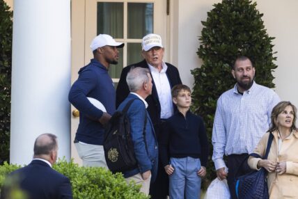 Saquon Barkley speaking with Donald Trump.