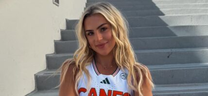 Haley Cavinder smiles at the camera.