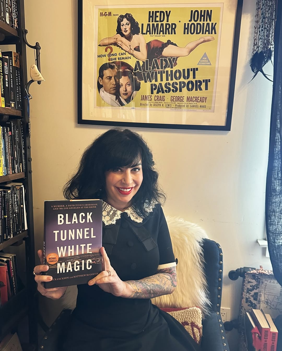 Jillian Lauren holding a book