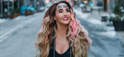 Laura Bryna with PAINKILLER tattoo