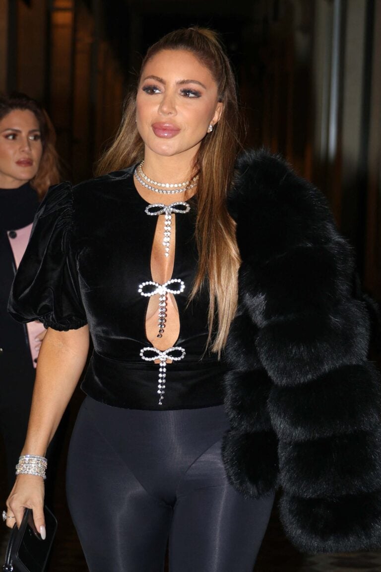 Larsa Pippen turns up the glam in skintight leggings and a cleavage-baring top for a chic night out in Paris