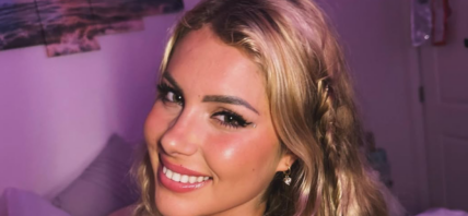 Andreea Dragoi smiles at the camera.
