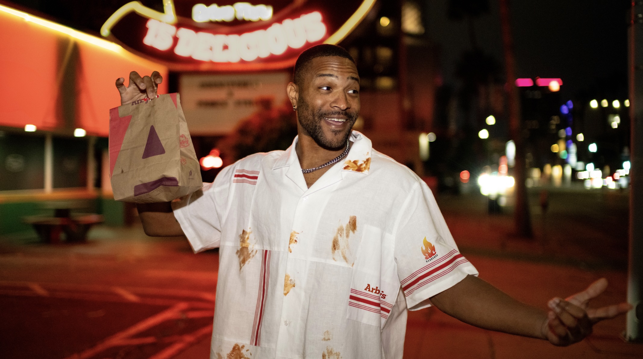 Man holding Arby's sandwich