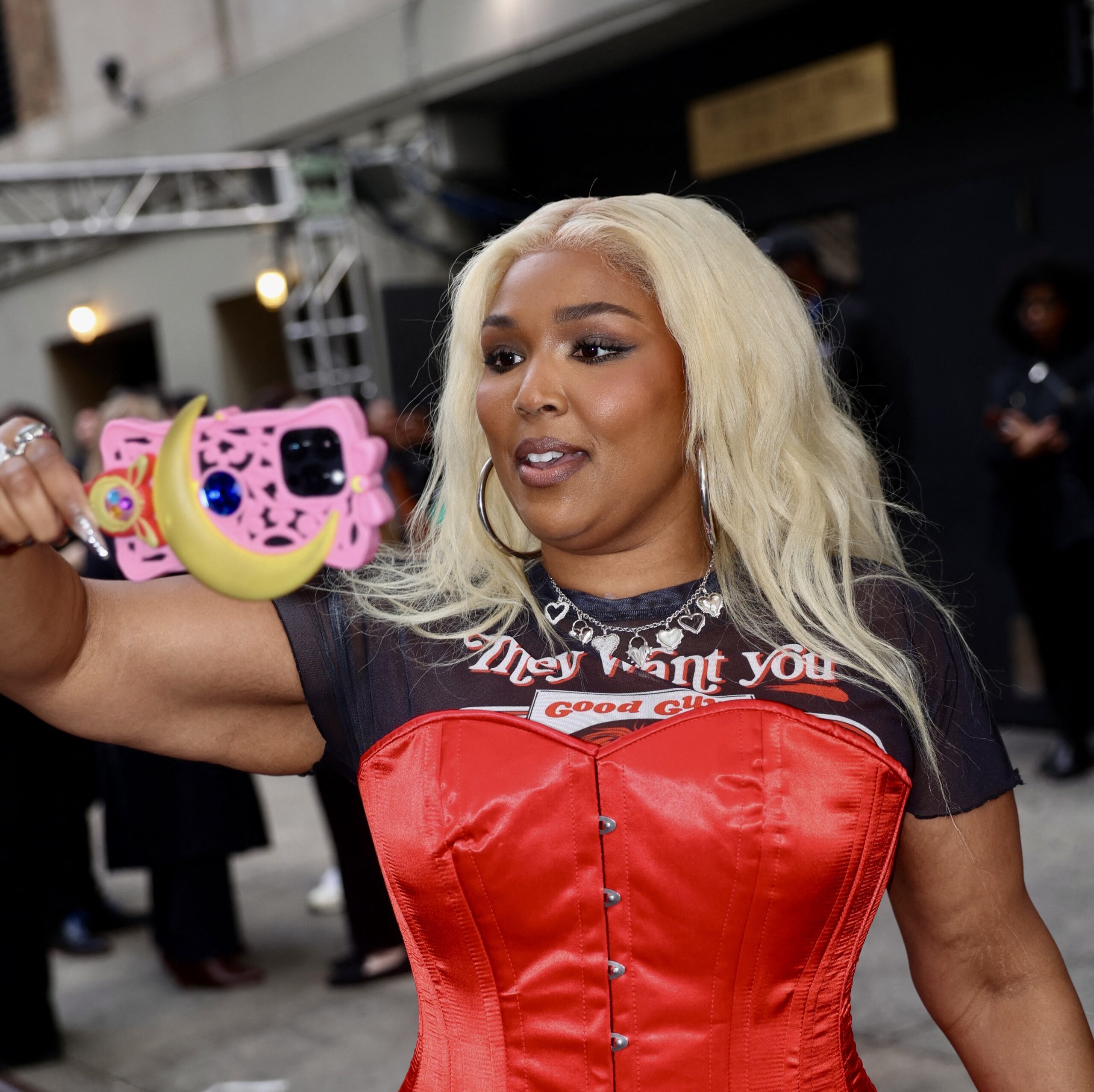Lizzo highlights trim waist and weight loss in red corset as she leads the stars at Amazon 2025 Upfronts