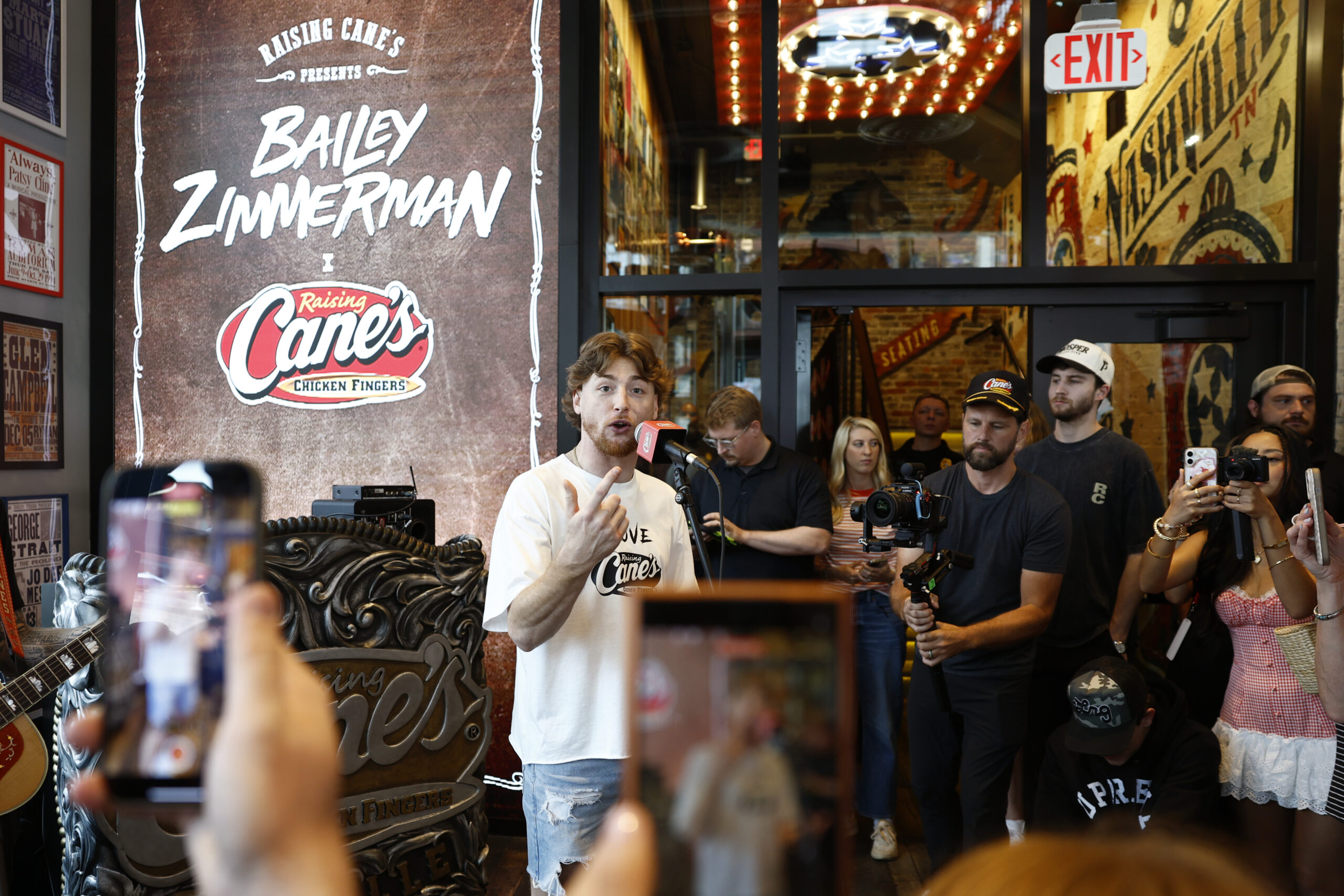 Country Singer Bailey Zimmerman Works CMA Fest "Shift" At Raising Cane's Nashville Flagship