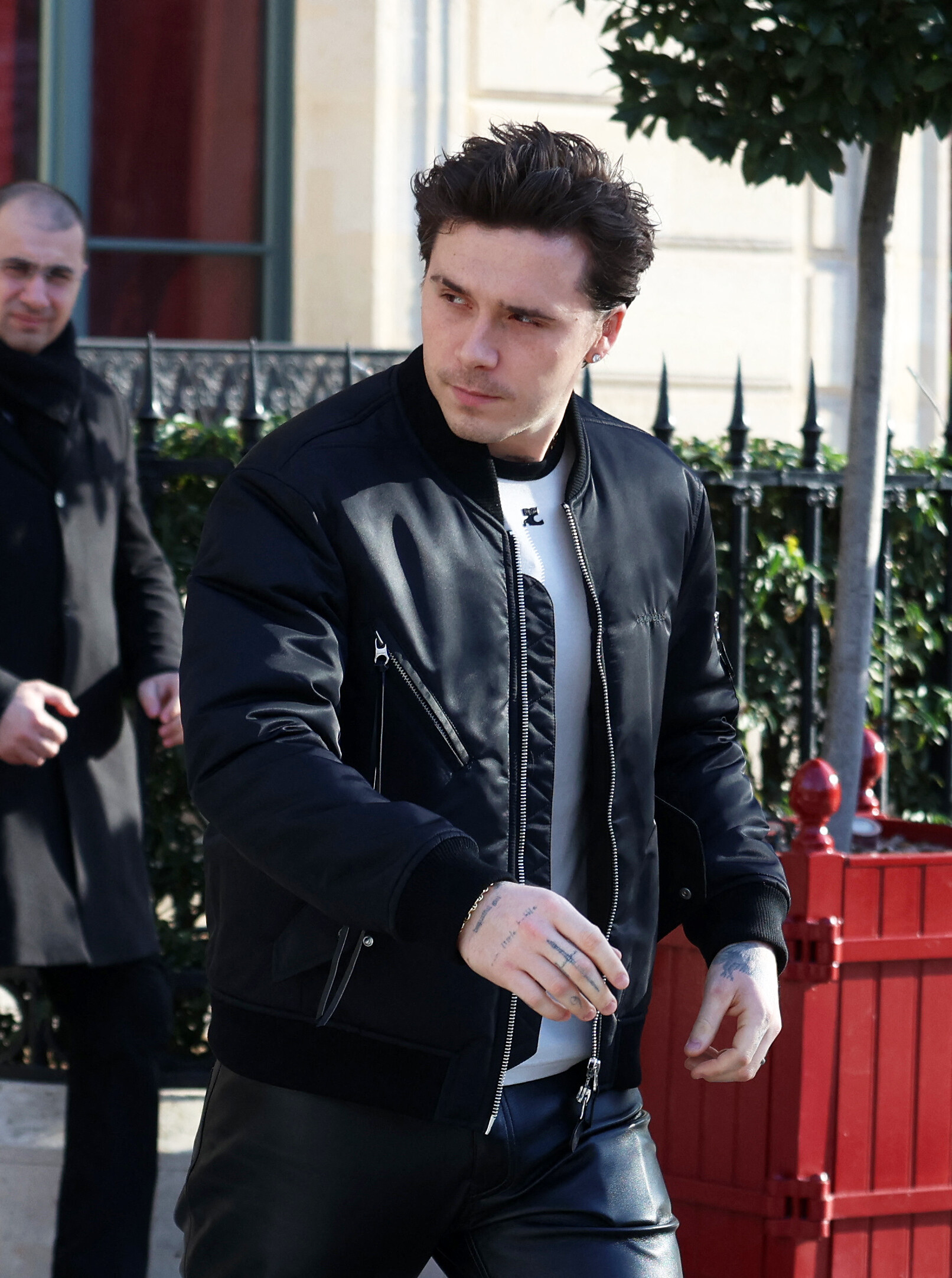 Brooklyn Beckham leaves his hotel