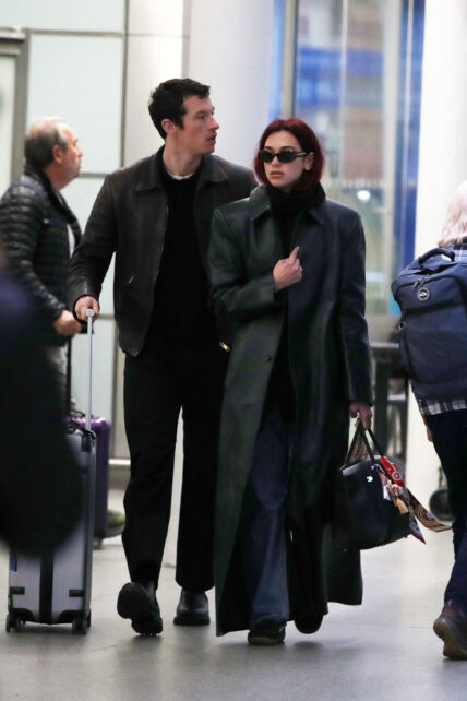 Dua Lipa and Callum Turner arriving back in the UK from Paris.