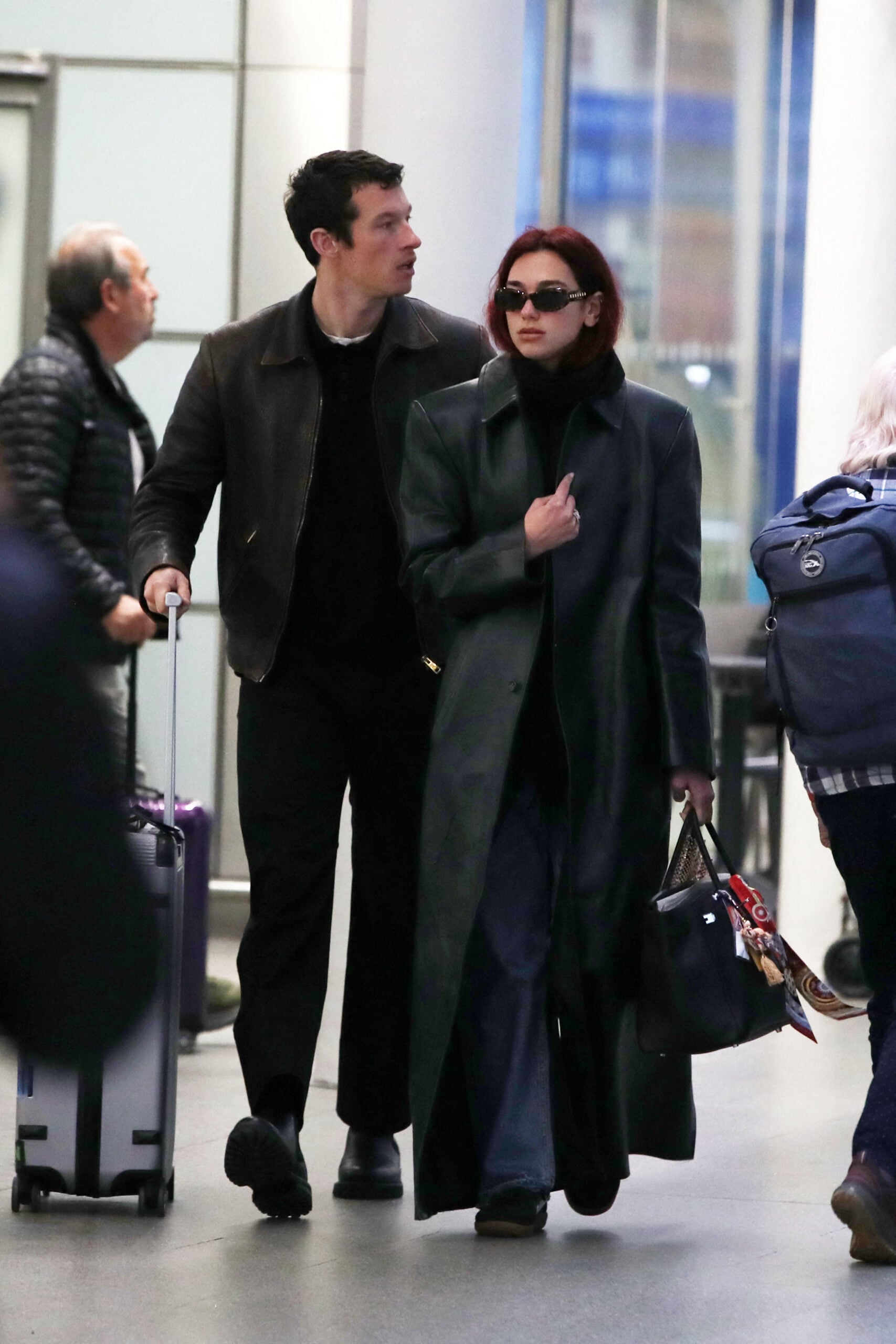 Dua Lipa and Callum Turner arriving back in the UK from Paris.