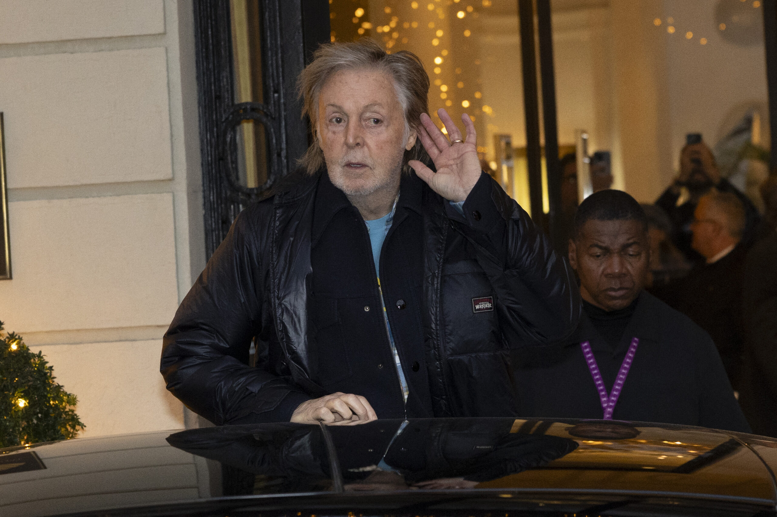 Paul McCartney leaves the hotel where he is staying in Madrid