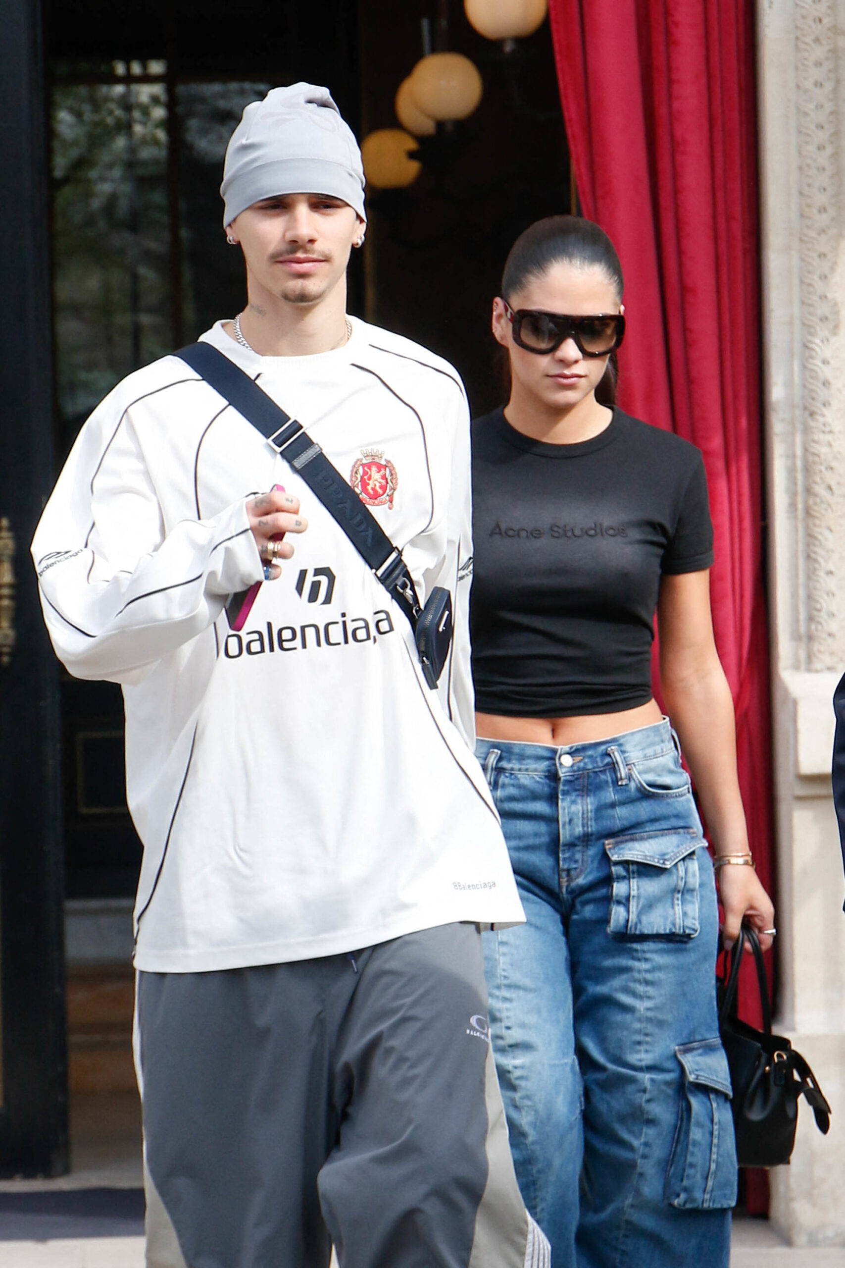 Romeo Beckham and Kim Turnbull seen leaving their hotel during Paris Fashion Week