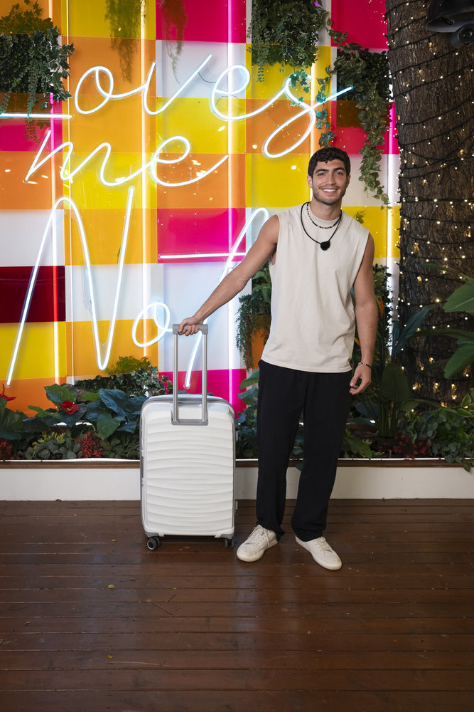 "Love Island" contestant leaving the villa. 